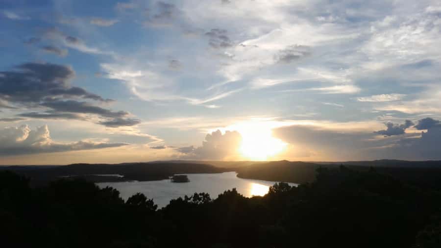 Flores: Yaxha Shared Sunset Tour with Transportation & Guide - The sunset stop is the payoff