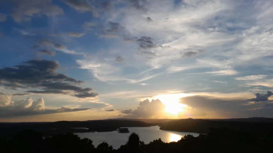 Flores: Yaxha Shared Sunset Tour with Transportation & Guide - Heat, rain, and uneven paths matter
