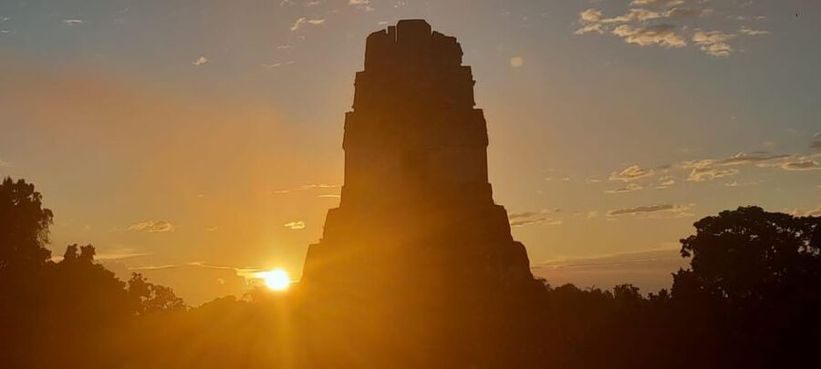 From Flores: Tikal Sunrise Archaeological Tour - Waiting for dawn at Temple IV