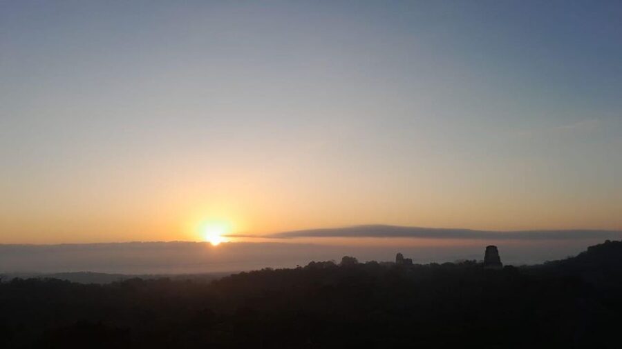 From Flores: Tikal Sunrise Archaeological Tour - The Great Plaza and Tikal’s best-known temples