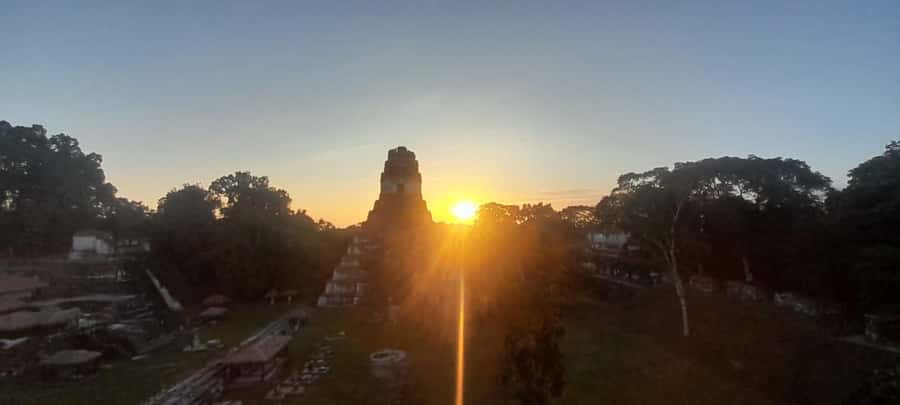 From Flores: Tikal Sunset Tour - Returning through the darkening park